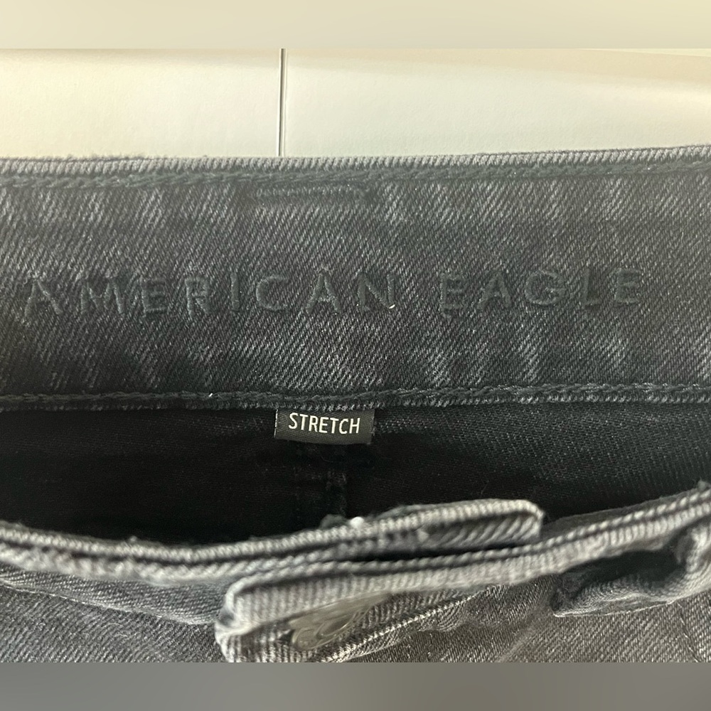 American Eagle black factory distressed jean skirt. Size 00 - Picture 7 of 10